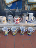 Collezione di boccali vintage in ceramica e vetro